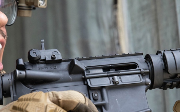 Spc. Nelson Medina communicates with his team