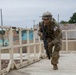 Sgt. First Class Juan Torres runs to cover