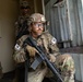 Spc. Nelson Medina goes through the tunnel and intel collection lane