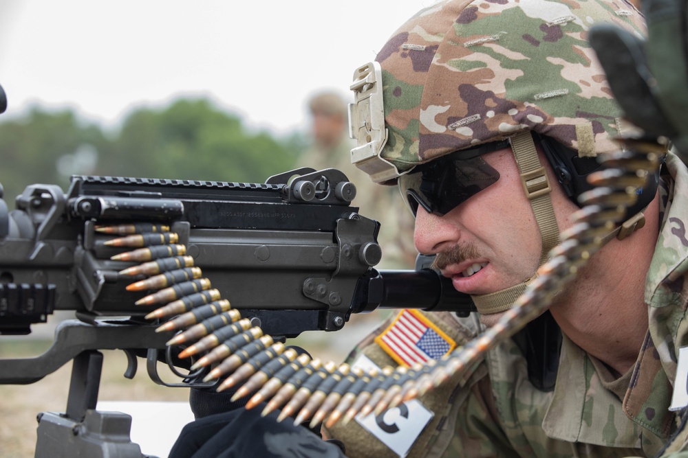 Spc. Coby Ecestein fires the M249