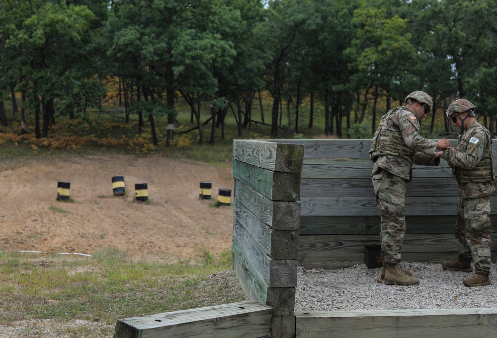 Spc. Justin Hepler practices throwing an M69 NATO practice grenade