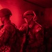 U.S. Army Reserve Best Squad competitors clear a room in the dark