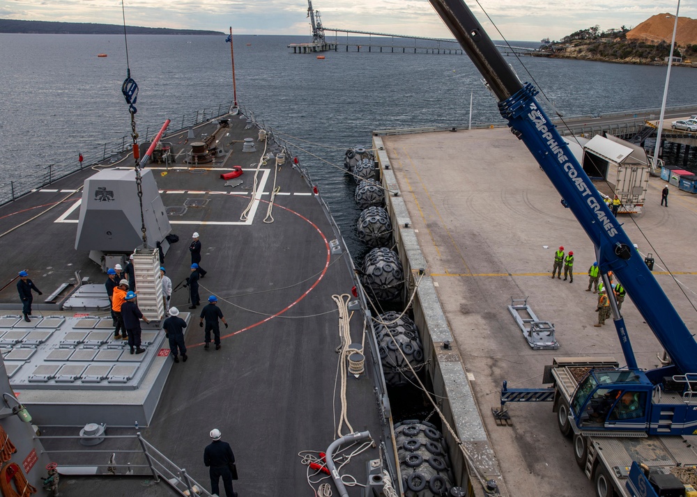 Destroyer USS Rafael Peralta completes first live missile on-load in Eden, Australia