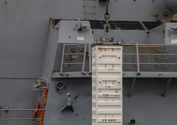 Destroyer USS Rafael Peralta completes first live missile on-load in Eden, Australia
