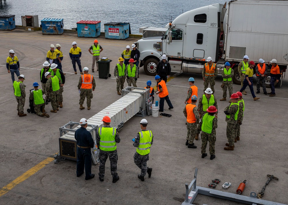 Destroyer USS Rafael Peralta completes first live missile on-load in Eden, Australia