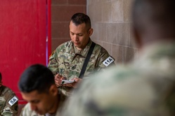 Sgt. 1st Class Luis Castillo takes notes [Image 2 of 3]