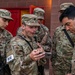 U.S. Army Reserve Best Squad competitors take a break to look at photos and videos