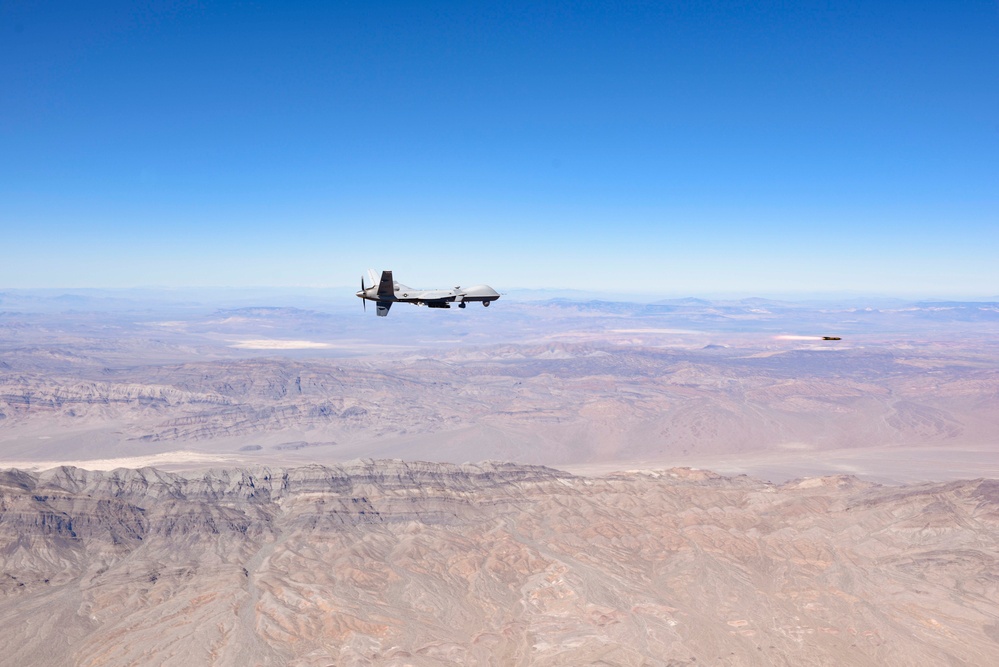 MQ-9 Hellfire launches in the desert