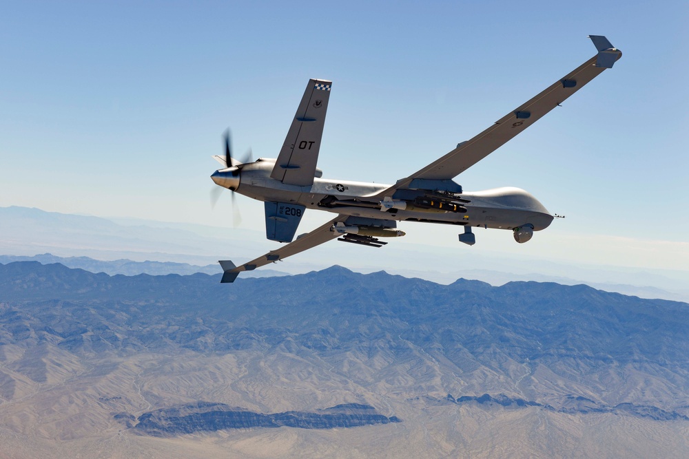 MQ-9 Hellfire launches in the desert