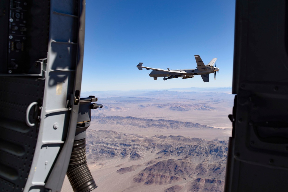 MQ-9 Hellfire launches in the desert