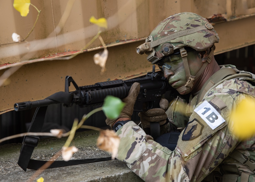 Army Spc. Jean Cruz pulls security