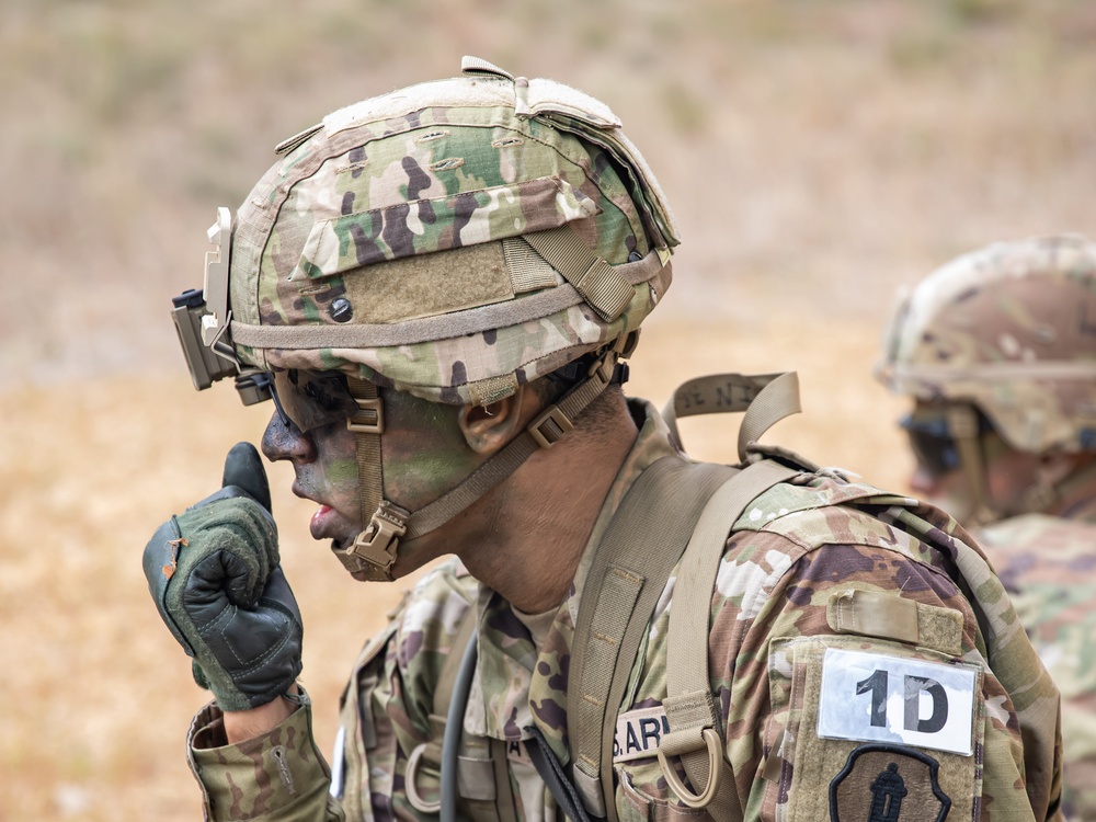 Army Spc. Elvin Rivera calls in a nine-line