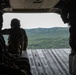 Army Reserve Best Squad competitors ride in a CH-47 Chinook