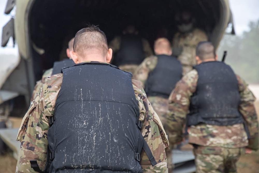 Army Reserve Best Squad competitors load onto CH-47