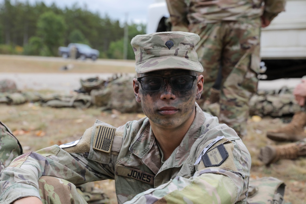 Spc. Jonathan Jones prepares to participate in the next event at the 2023 U.S. Army Reserve Best Squad Competition