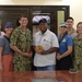 Joint Region Marianas Staff and Deployed Marines Visit the Office of Governor Emais Roberts