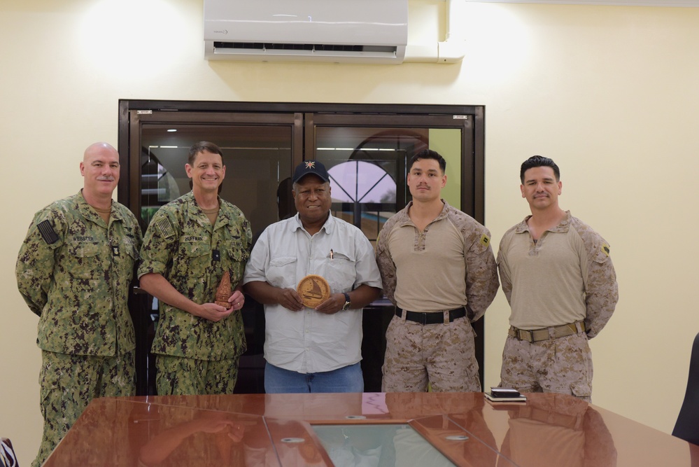 Staff from Joint Region Marianas and Forward Deployed Marines Take a Photo with the Governor of Peleliu