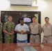 Staff from Joint Region Marianas and Forward Deployed Marines Take a Photo with the Governor of Peleliu