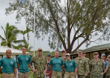 Rear Adm. Gregory Huffman visits service members stationed on Palau as part of the Civic Action Team