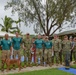 Rear Adm. Gregory Huffman visits service members stationed on Palau as part of the Civic Action Team