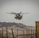 U.S. Navy MQ-8C Fire Scout first time ground refueling by U.S. Marine Corps CH-53E Super Stallion