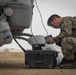 U.S. Navy MQ-8C Fire Scout first time ground refueling by U.S. Marine Corps CH-53E Super Stallion