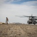 U.S. Navy MQ-8C Fire Scout first time ground refueling by U.S. Marine Corps CH-53E Super Stallion