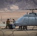 U.S. Navy MQ-8C Fire Scout first time ground refueling by U.S. Marine Corps CH-53E Super Stallion