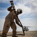 U.S. Navy MQ-8C Fire Scout first time ground refueling by U.S. Marine Corps CH-53E Super Stallion