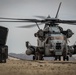 U.S. Navy MQ-8C Fire Scout first time ground refueling by U.S. Marine Corps CH-53E Super Stallion