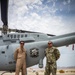 U.S. Navy MQ-8C Fire Scout first time ground refueling by U.S. Marine Corps CH-53E Super Stallion