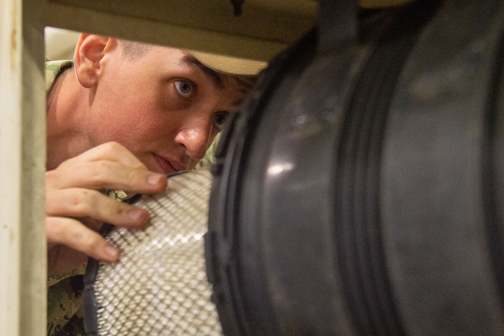 USS Ronald Reagan (CVN 76) Sailors perform daily maintenance