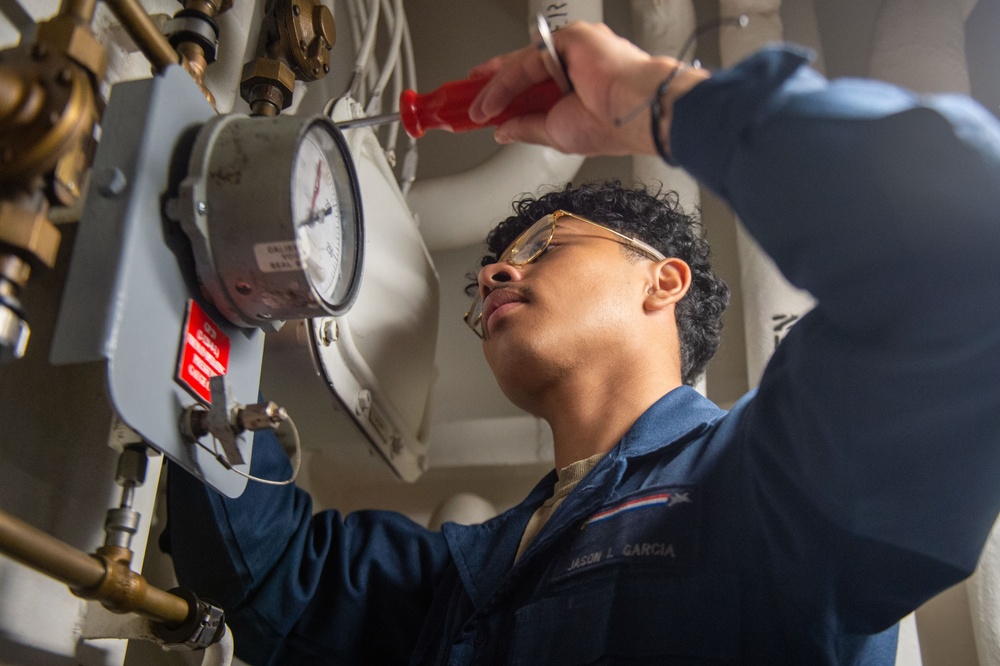 USS Ronald Reagan (CVN 76) Sailors perform daily maintenance