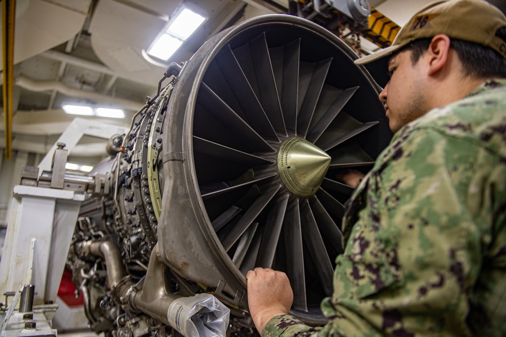 USS Ronald Reagan (CVN 76) Sailors perform daily maintenance