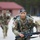 Spc. Robert Broughton heads toward the finish line of a 12-mile ruck march