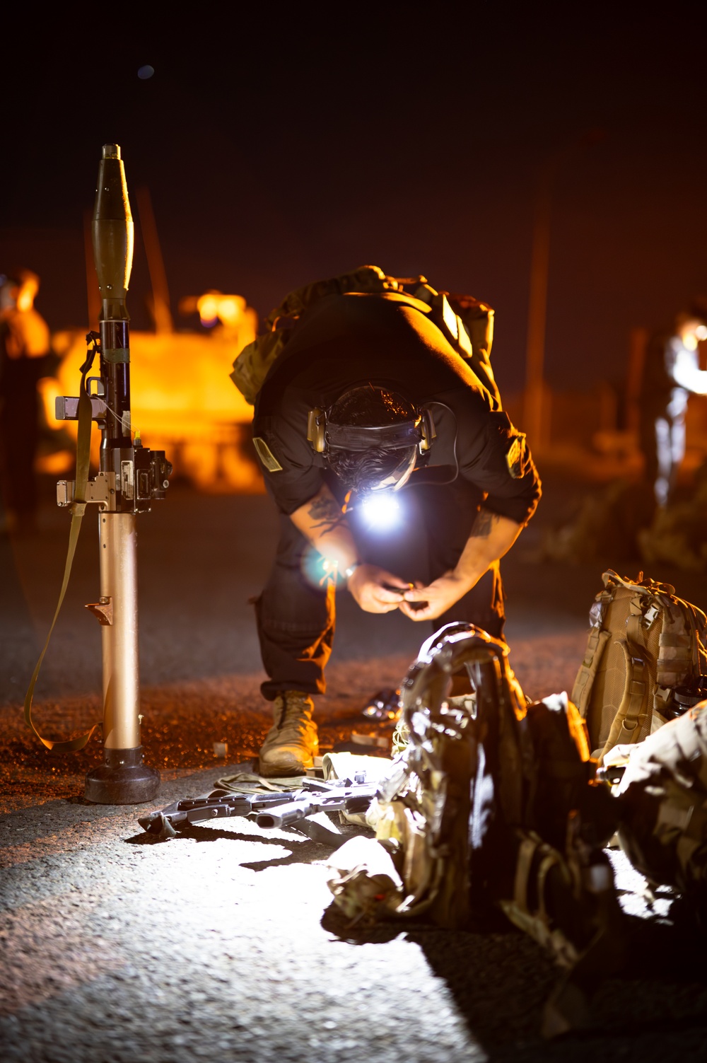 1st Battalion, 4th Infantry Regiment Soldier Loads Magazines