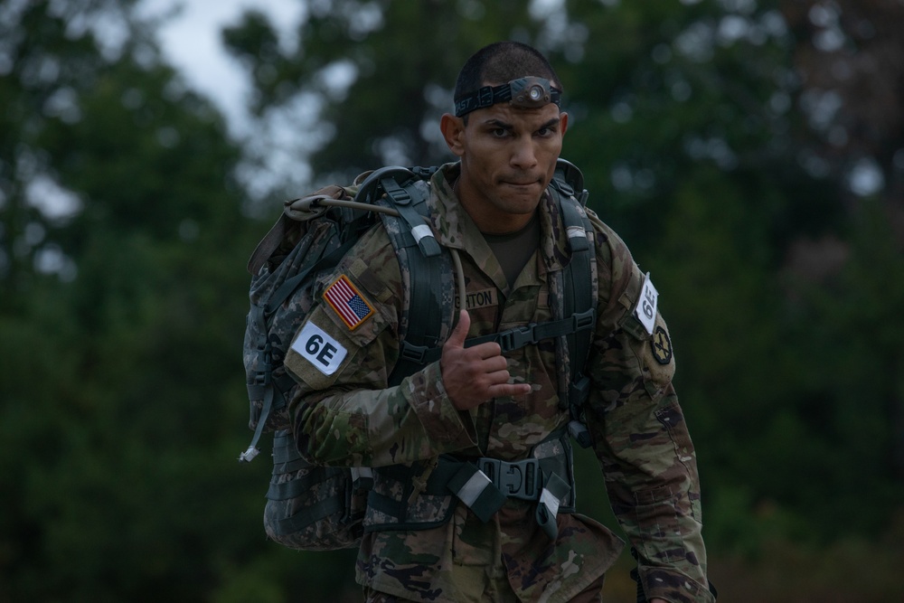 Spc. Robert Broughton rucks