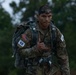 Spc. Robert Broughton rucks