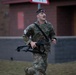 Sgt. Connor Housman runs with a weapon