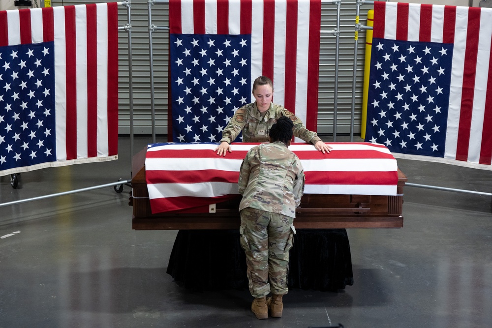 AFMAO Airmen assist with instructional flag draping video