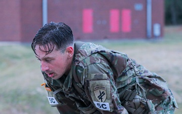 Spc. Matthew Dillion recovers after the 12 mile ruck march