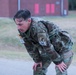 Spc. Matthew Dillion recovers after the 12 mile ruck march