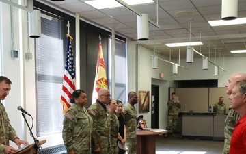 Ivy Division NCO is presented the Order of Martin of Tours Award