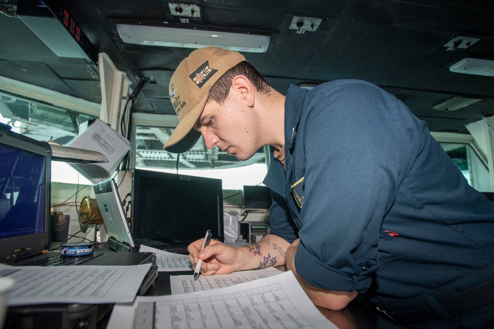 U.S. Navy Sailor Studies Navigation Rules