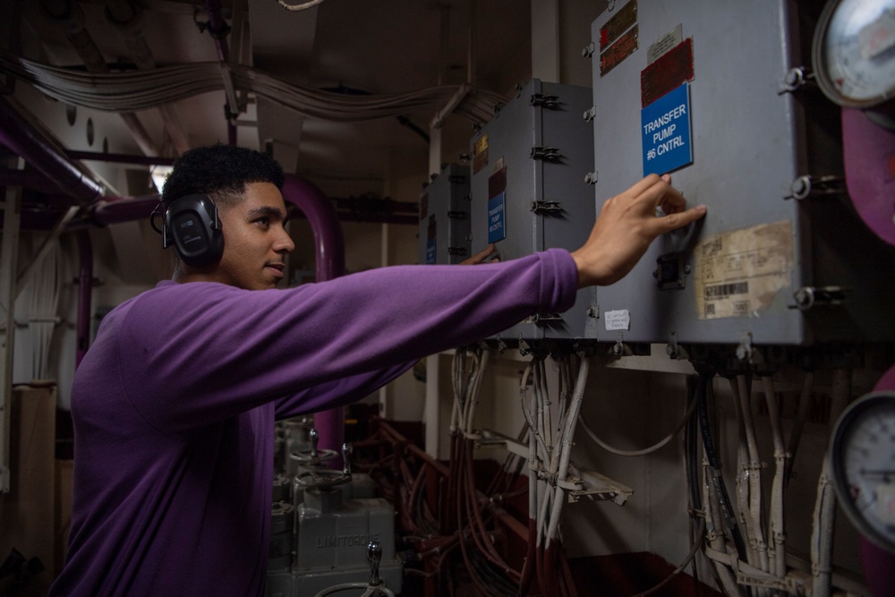 Sailor Conducts Maintenance