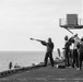 U.S. Navy Sailor Fires A Messenger Line