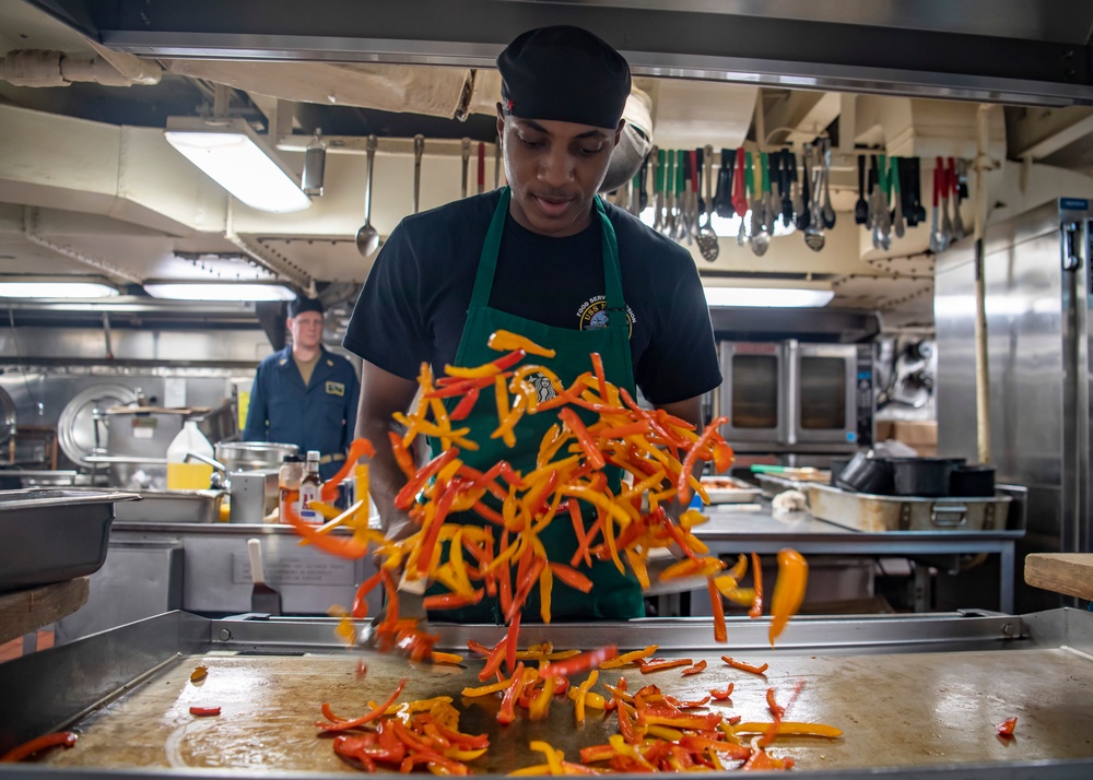 Sailor Prepares Food