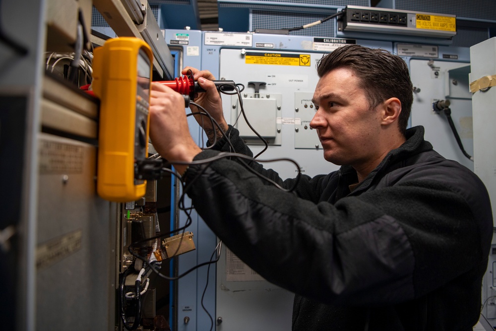 Sailor Conducts Maintenance