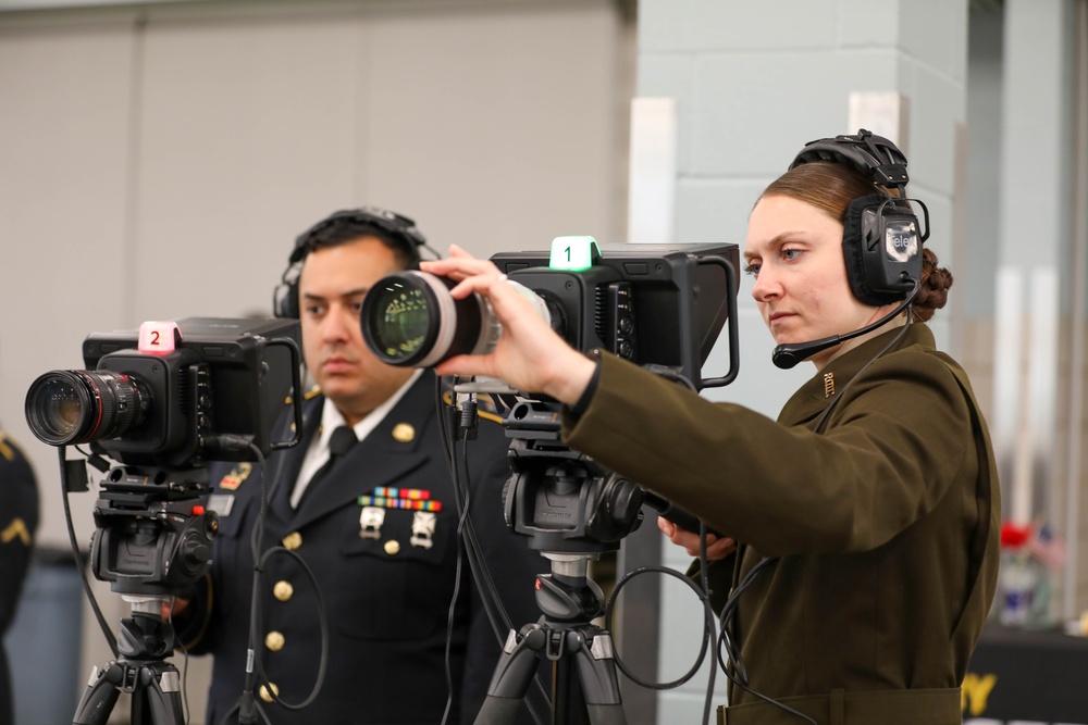 Spc. Frank Alacala (left) and Cdt. Brittney Joy operate cameras