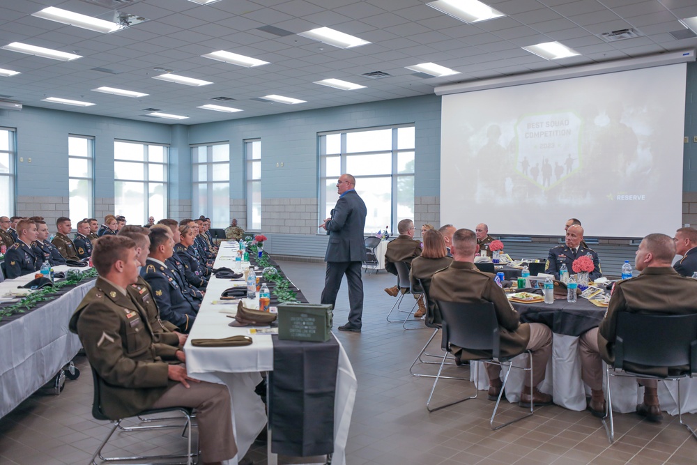 U.S. Army Reserve Best Squad competitors get a motivational speech during the award ceremony.